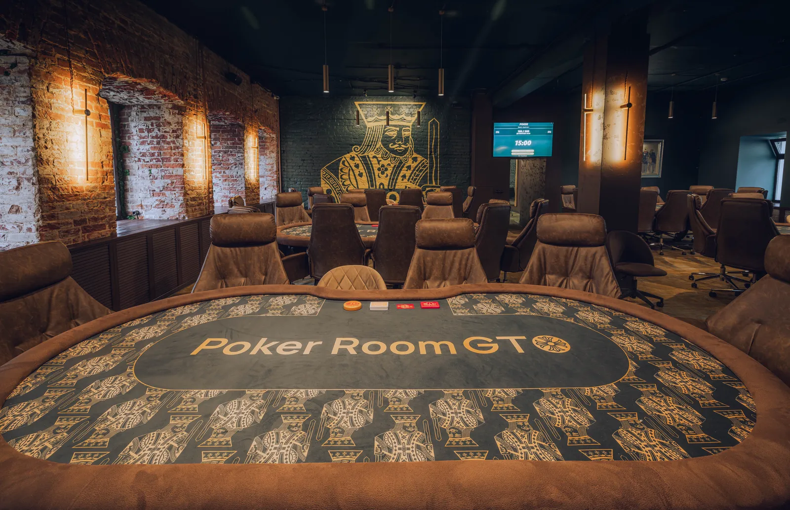 Poker Room GTO tournament table with a projection screen